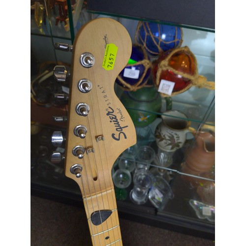 336 - Squire Fender Stratocaster style electric guitar with tremolo bar.