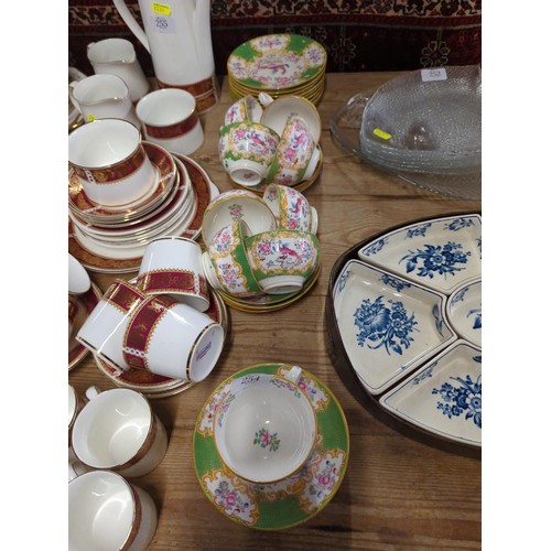 254 - Mintons tea cups and saucers and cake plates, 9 plates, c ups and 13 saucers.