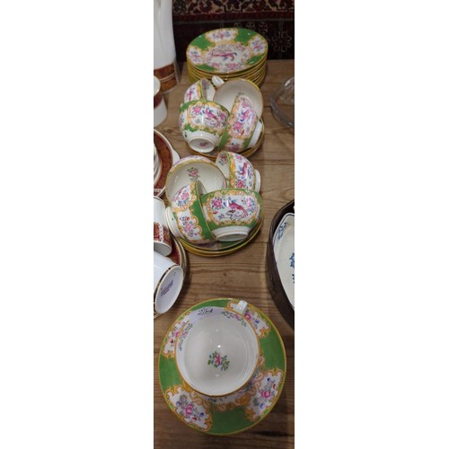 254 - Mintons tea cups and saucers and cake plates, 9 plates, c ups and 13 saucers.