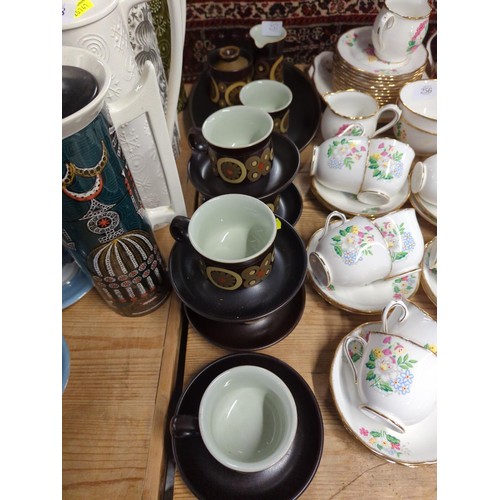 257 - Denby mid-century tea cups and saucers.