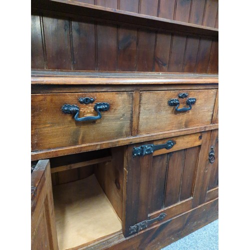 2 - Stained pine dresser with four drawers over cupboard. W 160 x D53 x H200cm