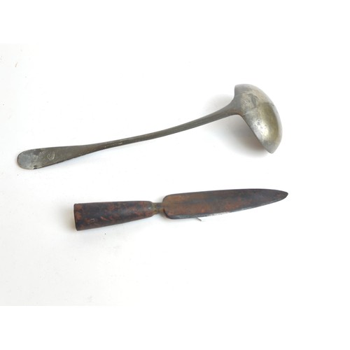 349 - A pewter ladle and a spear head (L. 25cm)