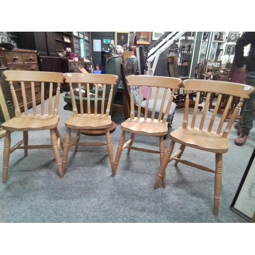 105 - Set of four beech dining chairs.