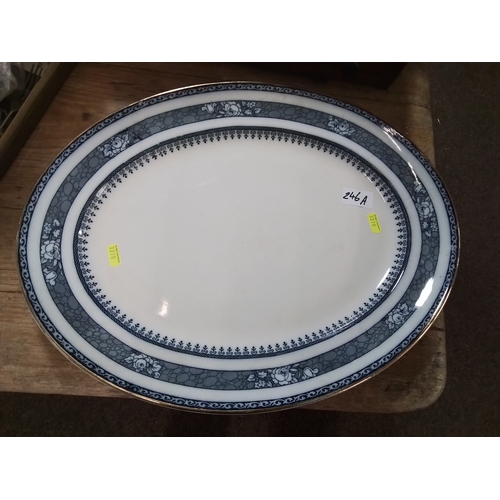 246A - Large meat plate with gilded finish and blue and white decoration.  L46 W36 cm