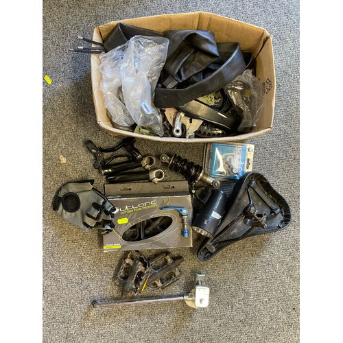 1244 - Box bike spares Inc 2 x pairs of pedals, brake levers, Seat, Light, Bar ends, shock absorber, brake ... 