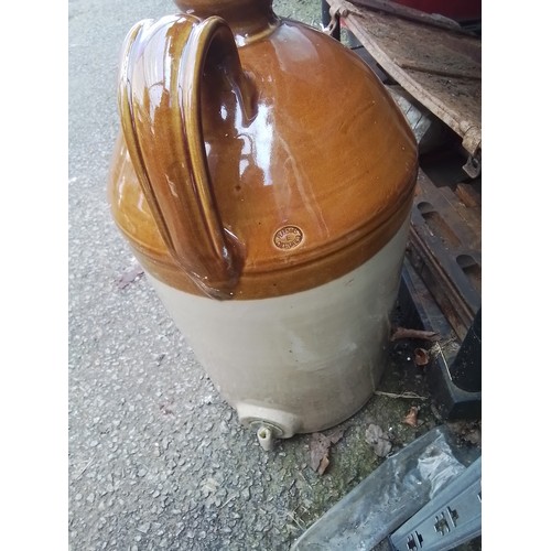 1037 - Large stone ware bottle with lid and tap, stamped Parsons Chesterfield