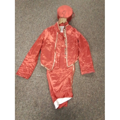 130A - Small Indian fancy dress bell boy outfit (dated 1936) red satin two piece suit and matching hat.ches... 