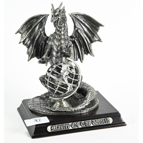 47 - Pewter 'Master of the World Dragon' figure with crystal globe, ht. 20cm