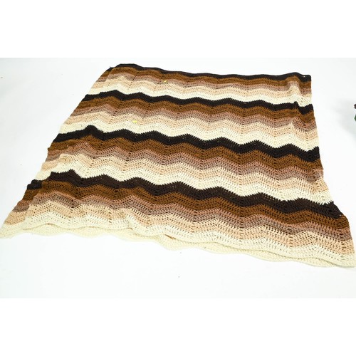 82 - Large woollen throw and a crochet blanket in browns and creams