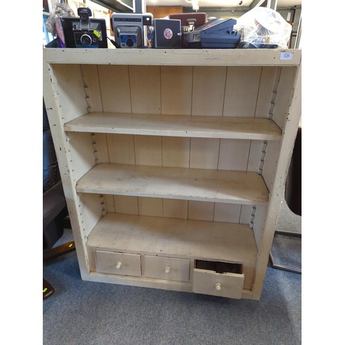126 - Painted adjustable shelf x 2 bookcase with three small drawers to base. W103 D36 H123 cm