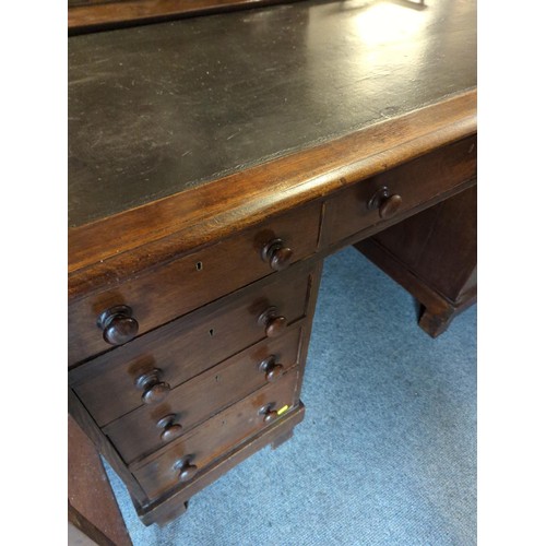 120 - Gentleman's oak writing desk with leather top and nine drawers with galleried back W138 x D86 x H83c... 