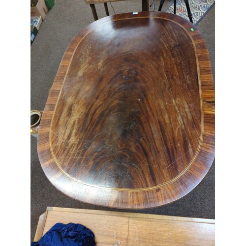 138 - Tilt top breakfast table with inlaid details and rounded edges 101 x 144 x ht. 72 cms