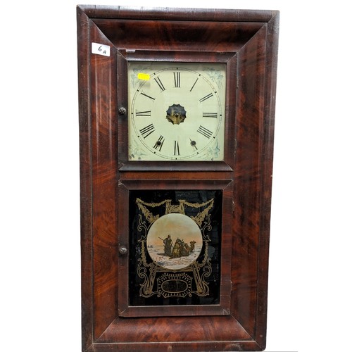 6A - Mahogany cased wall clock with Arabic depiction of desert scene to lower panel. H76cm W43 cm