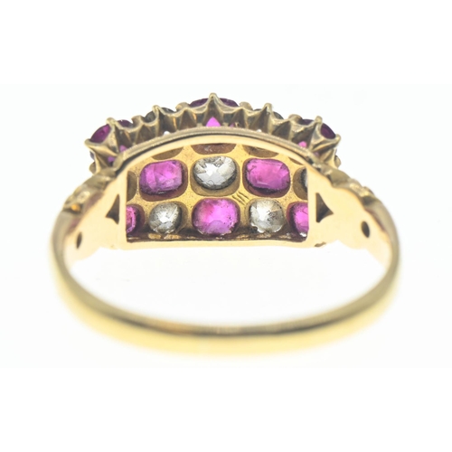 69 - Ruby and diamond cluster ring featuring old cut stones. Comprising of 8 rubies and seven diamonds. S... 