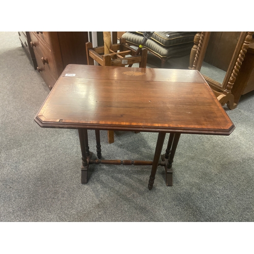 85A - Small inlaid drop leaf side/occasional table with turned stretcher and original castors. Closed dime... 