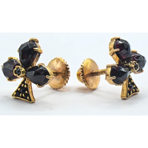 108 - Garnet and yellow metal 'club' ear studs, testing positive for 18ct gold, with screw back fittings, ... 