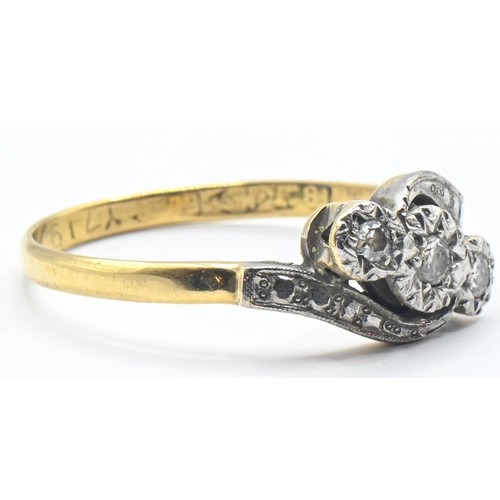 114 - 18ct gold and diamond crossover ring, size Q. Gross weight 2.63g