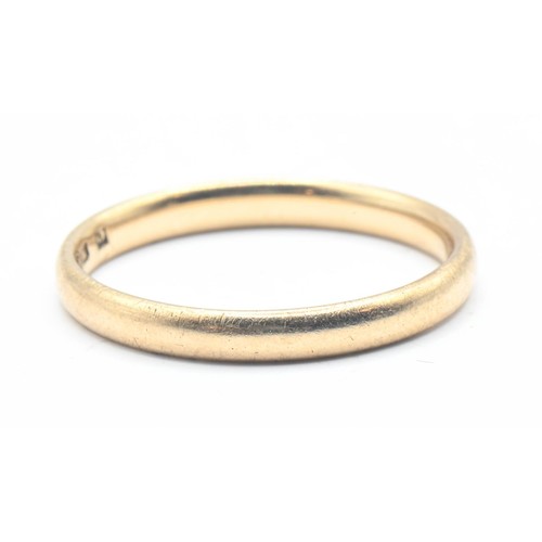 120 - Gold band with rubbed hallmark, testing positive for 9ct gold, size O, 1.94 grams