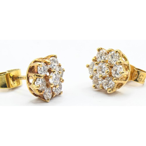 124 - Diamond cluster earrings set in 18ct gold. Head diameter approximately 8.2mm at widest point. Gross ... 