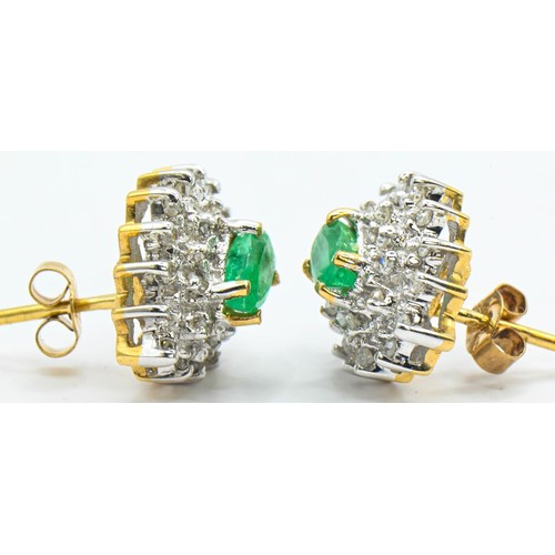 125 - Pear shaped emerald and diamond cluster earrings mounted on 9ct gold. Gross weight 1.98g