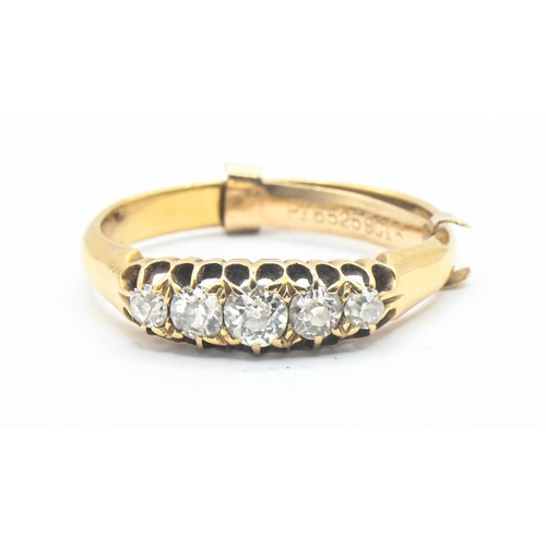 144 - 18ct gold and diamond five stone ring. With 9ct gold resize clip. Size N. Gross weight 3.16g