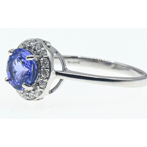 34 - 18ct white gold, tanzanite and diamond cluster ring, size N1/2, gross weight 3.25 grams