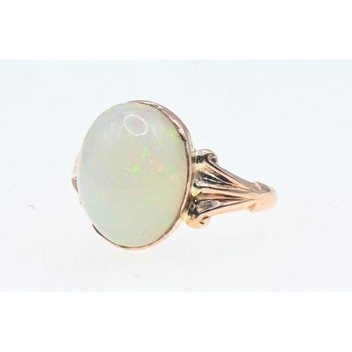 36 - 9ct gold ring set with a large oval cabochon opal (13.7mm x 10.7mm estimated). Size P/Q Gross weight... 