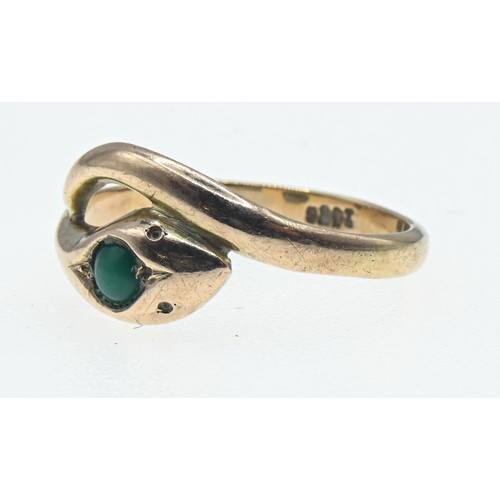 68 - 9ct gold crossover serpent ring set with green stone, size N, gross weight 2.38 grams