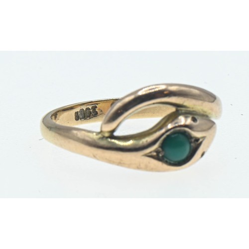 68 - 9ct gold crossover serpent ring set with green stone, size N, gross weight 2.38 grams