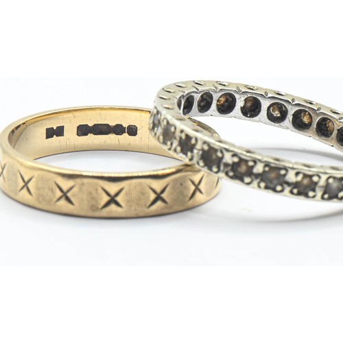 78 - Two 9ct gold rings, including an eternity ring set with white stones and the other with a continuous... 