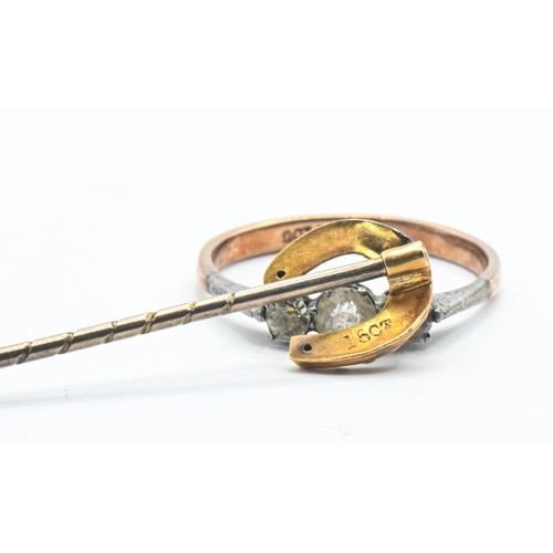 80 - 15ct gold horse shoe stick pin (1.18g) together with a paste set ring marked 9ct (1.63g).