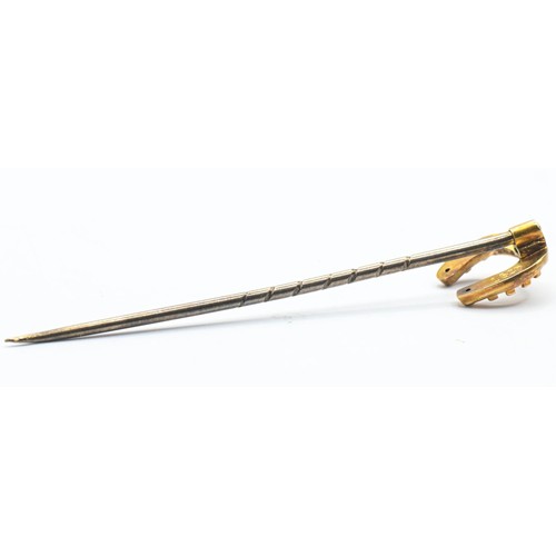 80 - 15ct gold horse shoe stick pin (1.18g) together with a paste set ring marked 9ct (1.63g).