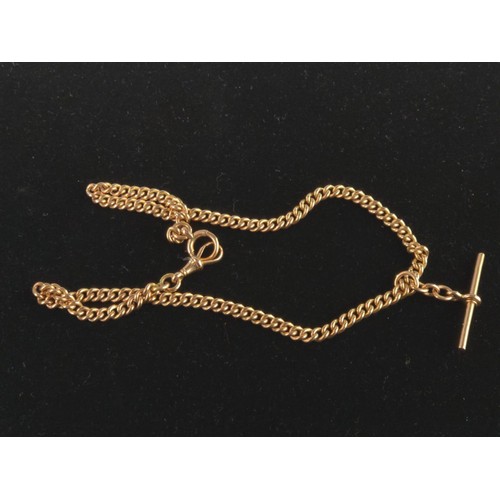 153 - 9ct gold watch fob on a 9ct gold curb link chain. Length 430mm. Gross weight 30.81g