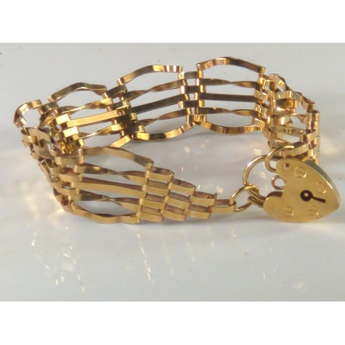 94 - 9ct gold gate link bracelet with heart clasp Circumference 170mm. gross weight 8.68g