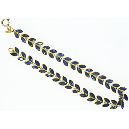 109 - 18ct gold and sapphire leaf design bracelet, 180mm long, gross weight 4.41 grams