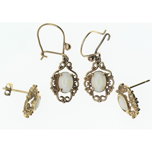 136 - Two pairs of opal earrings set with 9ct gold. Gross weight 3.04g