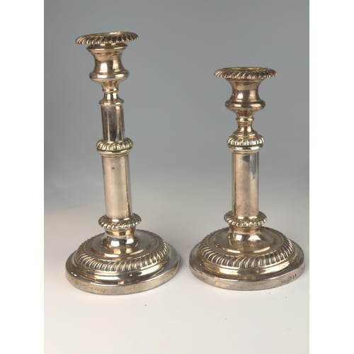 347 - Pair of George IV telescopic candlesticks, maker's mark rubbed, Sheffield 1825, with gadroon rims on... 