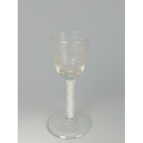 329 - Three English late 18th century double-series opaque twist wine glasses, one with an etched bowl, ea... 