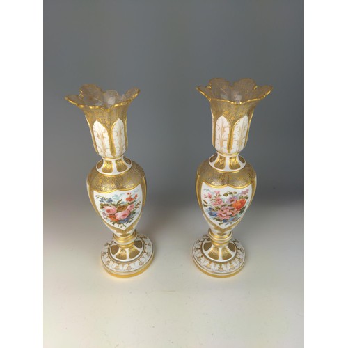 332 - Pair of Bohemian painted and white overlay glass vases, each painted with a gentleman or a lady, wit... 