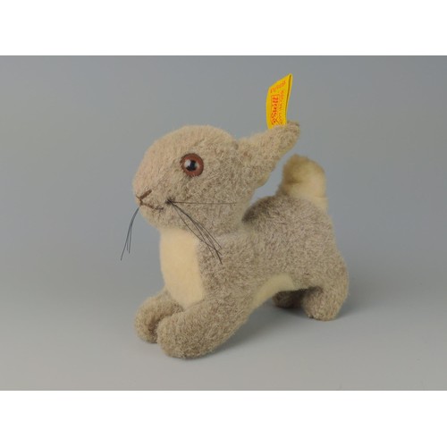 401 - Steiff 'Hoppy' miniature EAN 150113. Together with Steiff brown rabbit made in german 1995