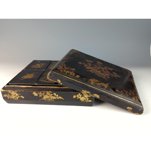 410 - Black and Gilt lacquered oriental box with 6 internal fitted boxes W29 D26 H9cm