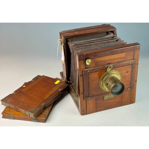 415 - Wood encased plate camera dating to 1884 with brass f9 4.5mm lens and other brass furniture with two... 