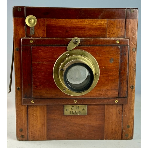 415 - Wood encased plate camera dating to 1884 with brass f9 4.5mm lens and other brass furniture with two... 