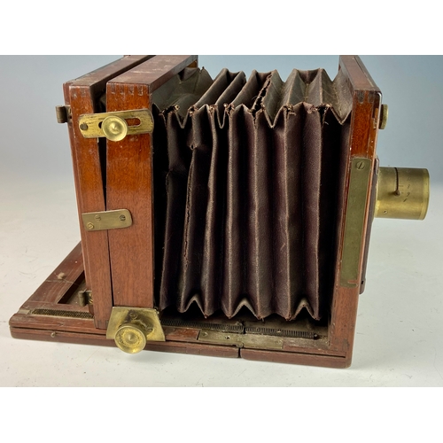 415 - Wood encased plate camera dating to 1884 with brass f9 4.5mm lens and other brass furniture with two... 