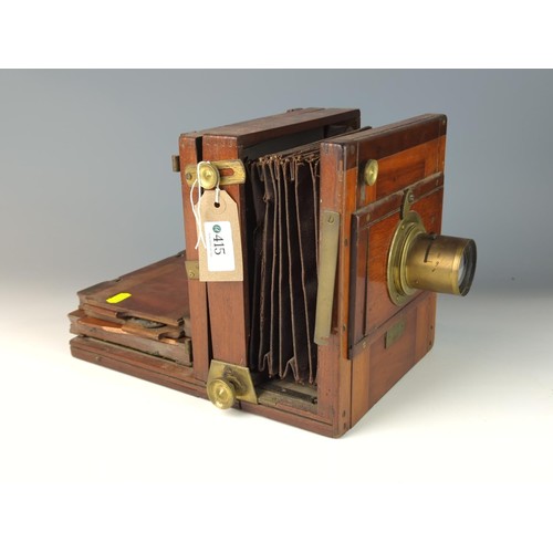 415 - Wood encased plate camera dating to 1884 with brass f9 4.5mm lens and other brass furniture with two... 