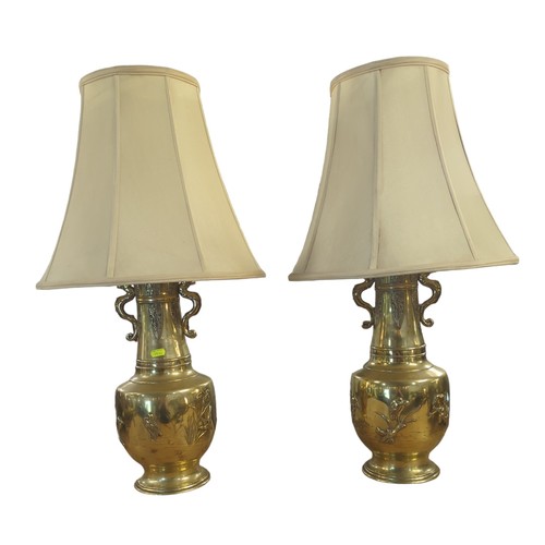 419 - Pair of Japanese brass urn lamps with fitted lampshades and flora and fauna decorations H77cms