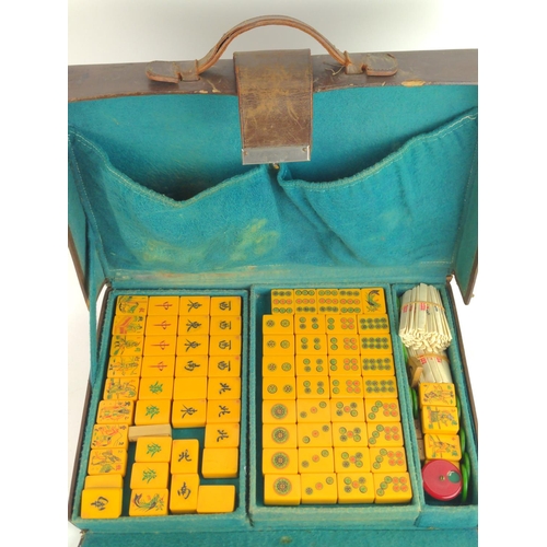 433 - Early C20 Mahjong set in leather case, 156 tiles