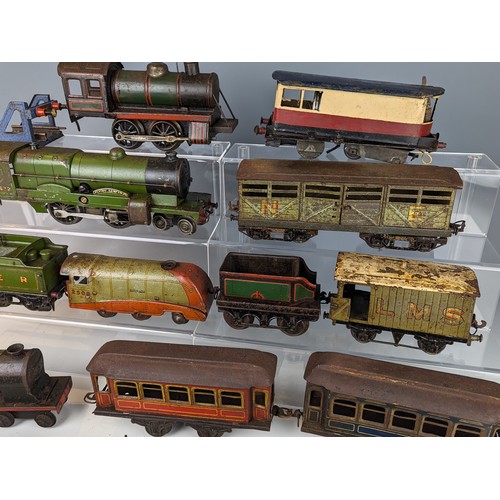 423A - O gauge trains and clock work cars, including 4 Engines, 3 cars inc The Bluebird, rolling stock and ... 