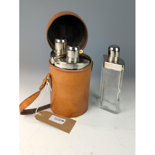 405 - 3 Piece triangular lead glass shooting flasks in purpose made leather case D10.5 H18.5cm