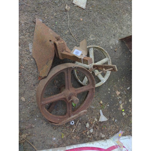 508 - 3 x small pieces of agricultural Items Inc two small cast iron wheels and a small plough attachment,... 